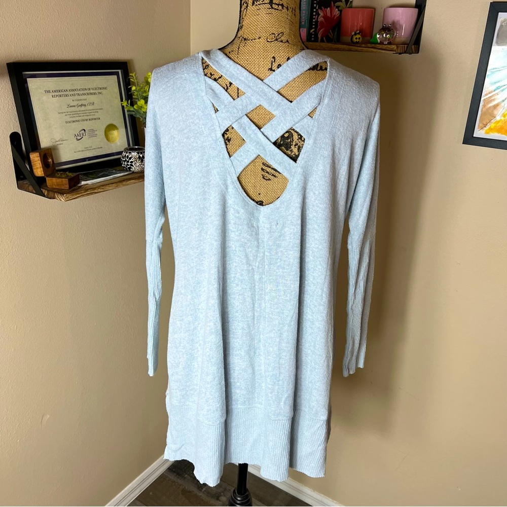 Miss Chievous blue tunic style sweater open criss cross back.